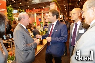 Matthias Fekl of France and Alain St.Ange of Seychelles meet at the Paris Tourism Trade Fair