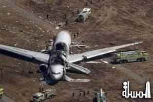 فريق طبى يرقم ضحايا حادث الطائرة الروسية لاخذ العينات للتعرف على هاوية الجثث