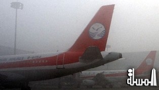 10آلاف راكب عالقون في مطار صينى بسبب الضباب الكثيف