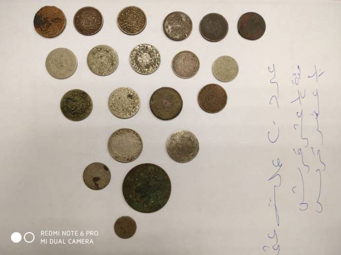 ضبط 324 عملة معدنية أثرية ترجع لعصور مختلفة بمطار القاهرة الجوي